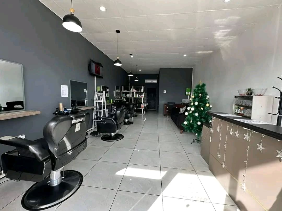 Grooming Lounge barbershop and salon interior